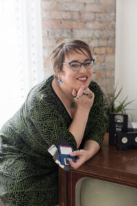 Photo of Dorothea Salo leaning on a television